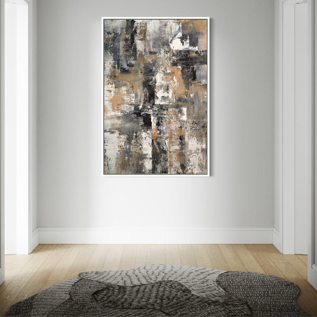 Abstract art painting in a modern interior setting with wooden floor and rug.