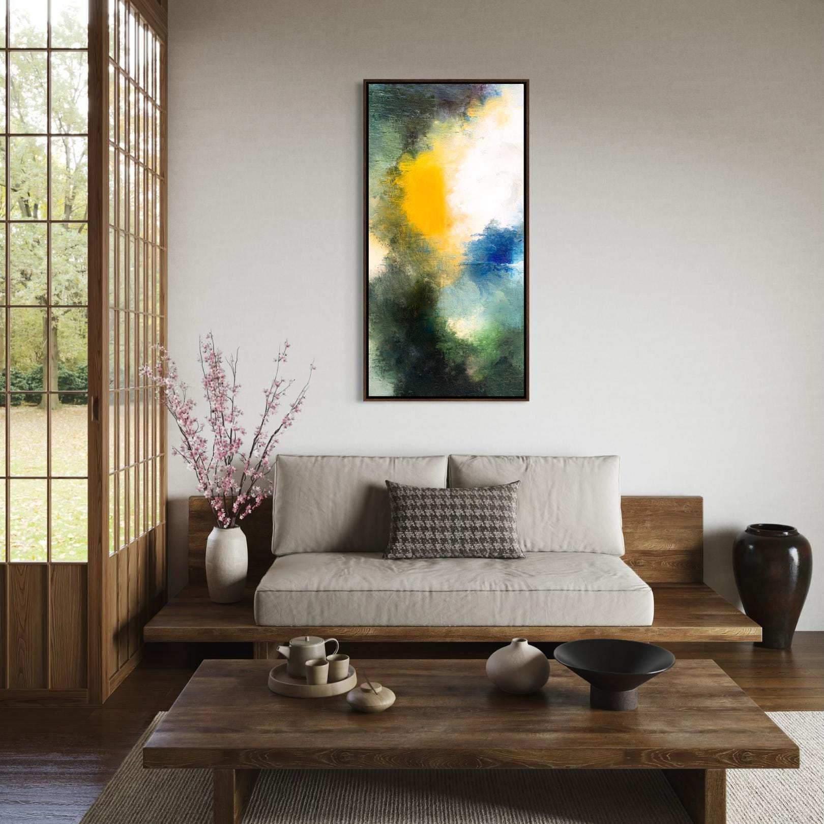Abstrakte Wandkunst mit gelbem, blauem und grünem Farbenrausch